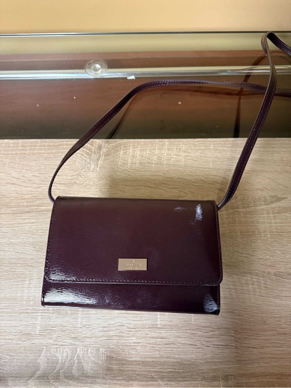 kate spade glossy patent crossbody in plum